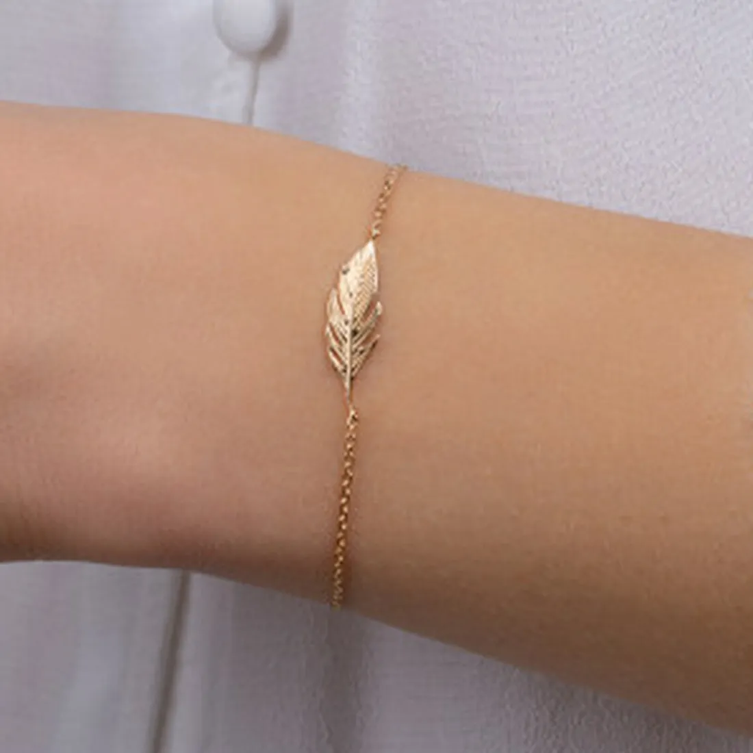 Bracelet Femme fantaisie plume plaqué or Maison de la Bijouterie UYZ353ZV