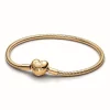Bracelet maille serpent fermoir cœur Doré